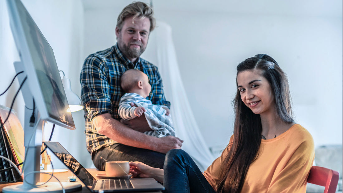 Working Women with Dad handling Child